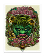 Digital drawing of a monster Gaira with green slimy skin with large bowels and green stringy hair with two yellow flowers in their hair. They have large green teeth and large pink lips. The head of the monster is surrounded by a rung of pink, yellow and green flowers with the words "War of the Garanturs" above and "Gaira" below. The drawing has a white border