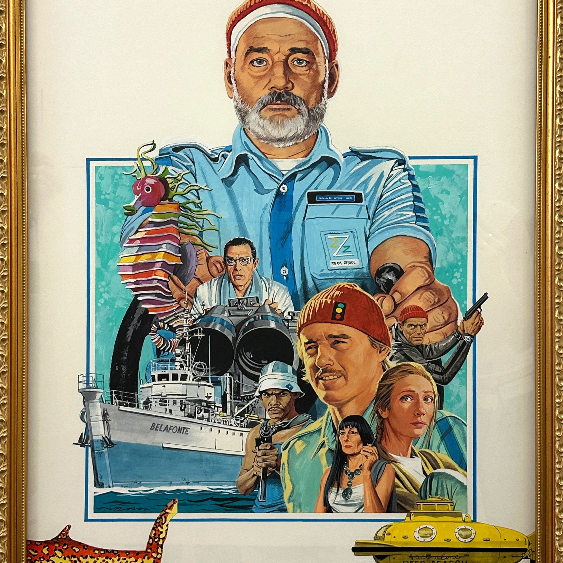 Spoke Art illustrated movie poster inspired by Paul Mann, showcasing a bearded man in a red beanie, the Belafonte boat, yellow submarine, colorful fish, stylized shark, and more—all in a gold frame. A tribute to Life Aquatic.