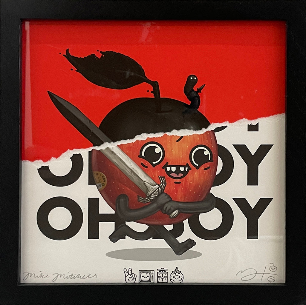 A framed Spoke Art piece by Mike Mitchell shows a cartoon apple with a face, arms, and legs running with a sword against a torn red-white "OHOY" background; a small creature sits on the apple. Created for Spoke Art's 15th Anniversary Show.
