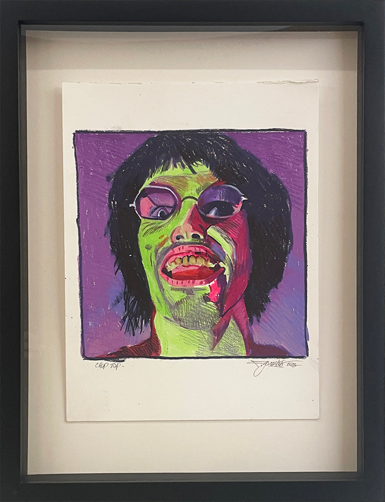 A Spoke Art framed painting depicts a smiling person with green and pink-tinted skin, dark hair, and sunglasses on a purple background, capturing bold, expressive style and vibrant energy.