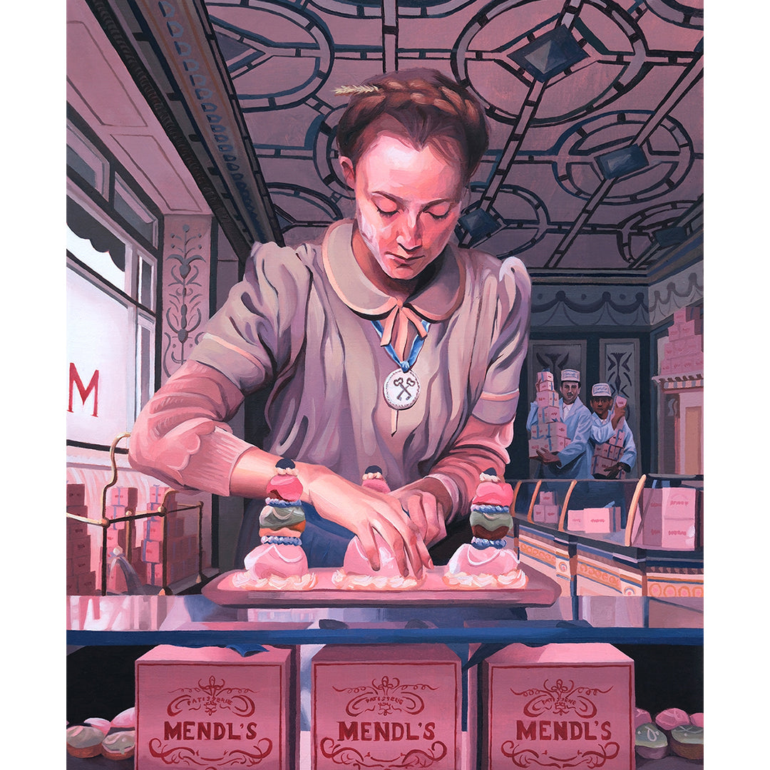 In a bakery reminiscent of The Grand Budapest Hotel, a uniformed individual carefully arranges pastries with colorful toppings near boxes labeled Hannah Gillingham, while the bustling background mirrors an oil on canvas scene.