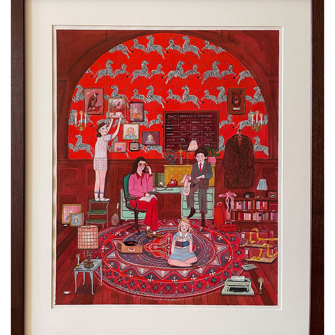 A cozy room, reminiscent of The Royal Tenenbaums, features vibrant red wallpaper. One person reads, another adjusts a picture, and a third plays on the floor. Framed in wood with bookshelves, a round rug, and decorations from Jill Kittocks Bad Dads IX collection.