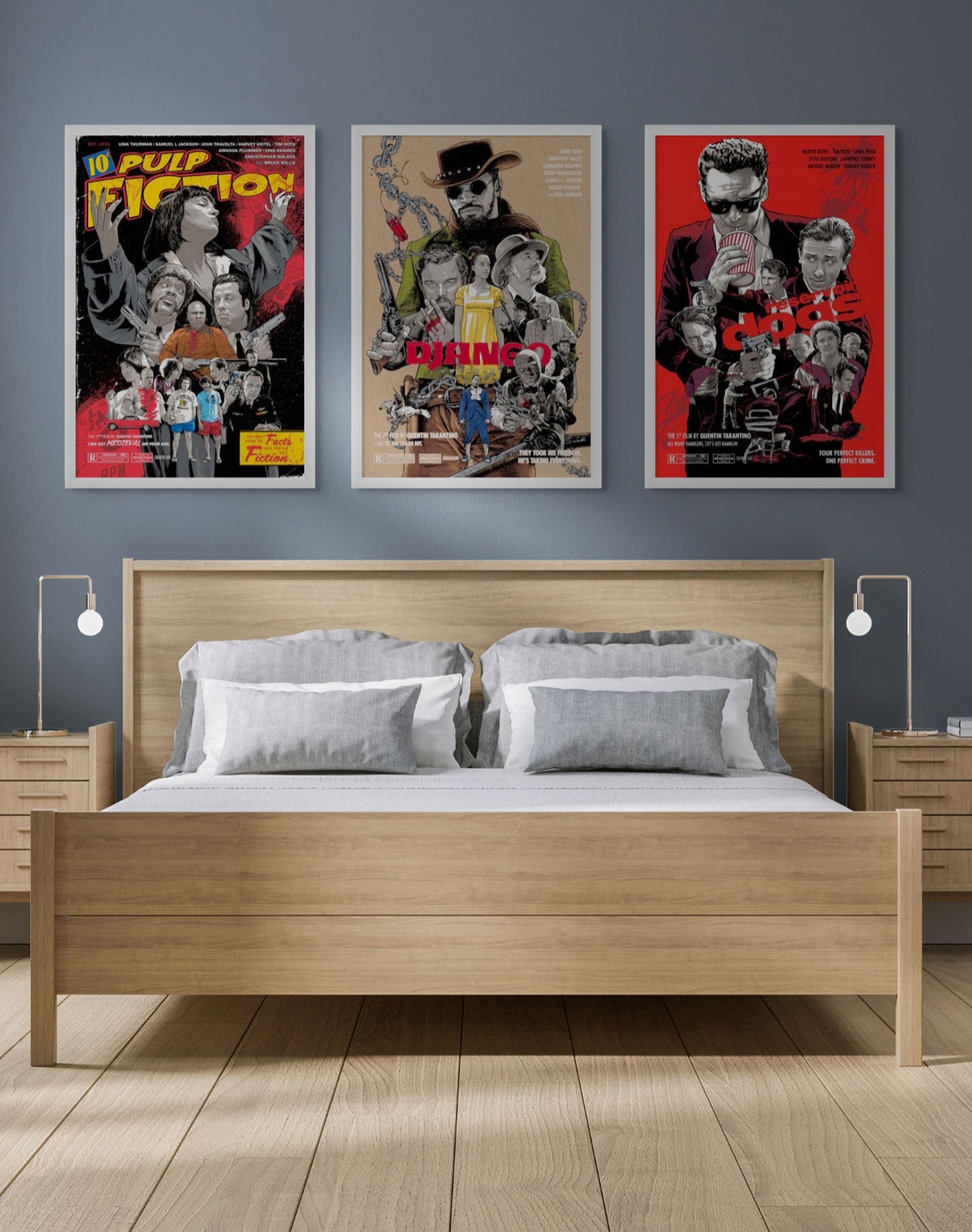 Bedroom with a wooden bed, white bedding, and two bedside tables with lamps. Three colorful movie posters are hung on the gray wall above the bed. The posters have vibrant artwork and text, set against hardwood flooring.