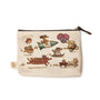 A beige Spoke Art pouch showcases playful Dogs On The Go illustrations of dogs riding a rocket, sled, motorcycle with balloons, red wagon, and a red dog-shaped vehicle—celebrating fun adventures together.
