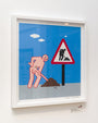 This custom framed artwork by Joan Cornellà showcases a cartoon figure resembling a roadwork sign with someone digging, set against a blue backdrop with white clouds. It captures Cornellàs distinctive style and looks stunning on a white wall.