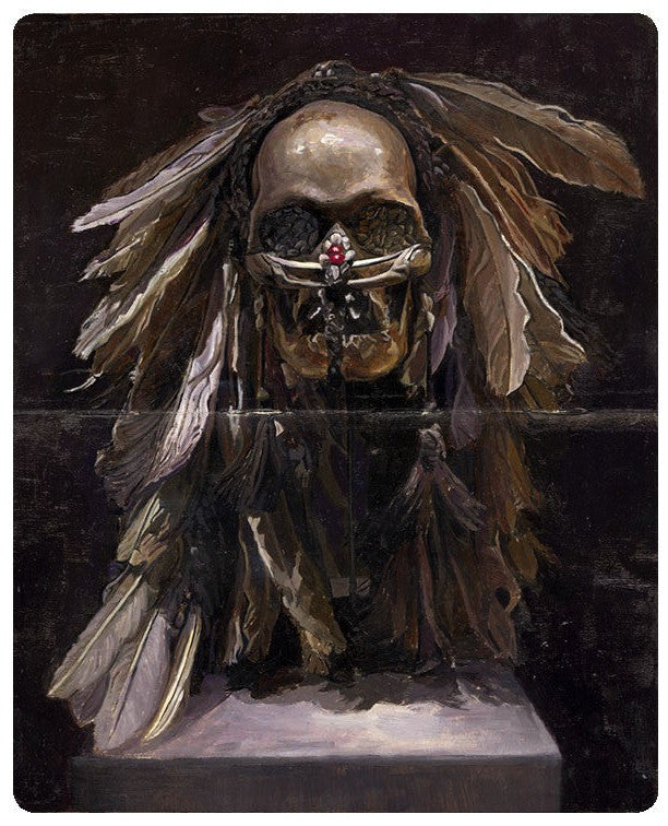 The Ancestor Skull sculpture, with a feathered headdress, intricate details, and a central red gem, reflects the dark ambiance of Greg Gandys oil-on-Moleskine works.