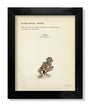 The Max Dalton framed fine art giclee print displays a script page featuring Frodo, Sam, and Gollum, complemented by an illustration of crouching Gollum. This piece from the Lord of the Thrones exhibition is set against a plain white background.