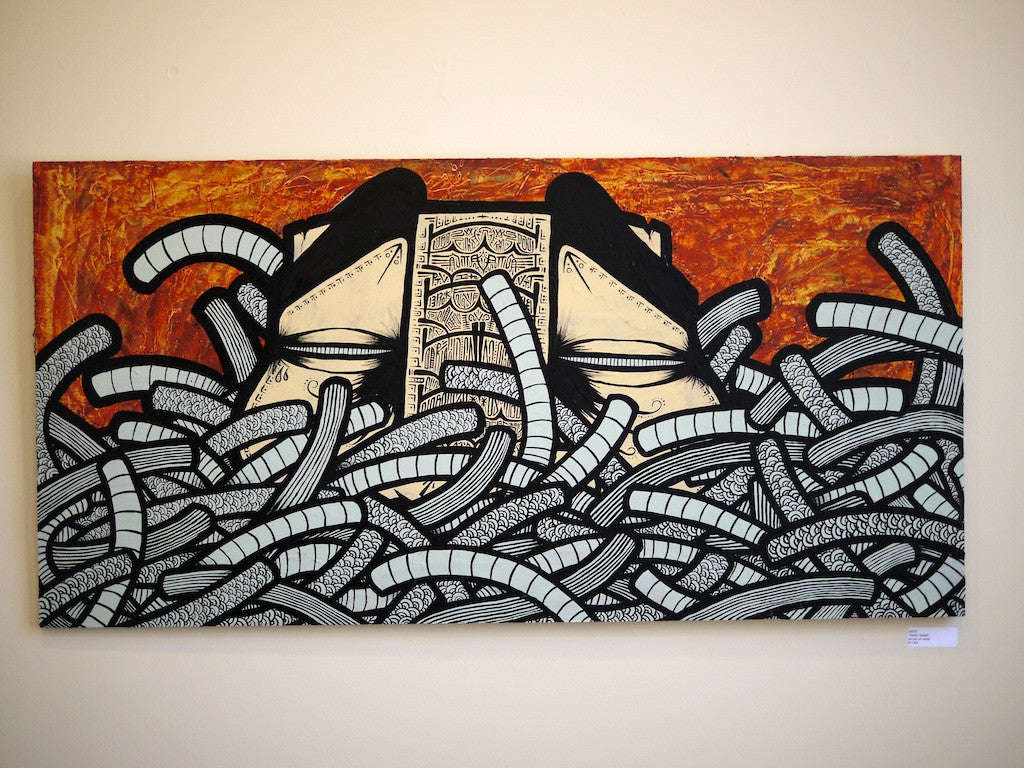 GATS presents an abstract acrylic piece on wood, showcasing a face with closed eyes amidst swirling snake-like patterns. The textured earthy red background enhances the depth and contrast of the black and white design elements.