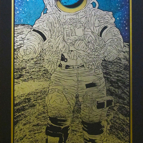 A vibrant and intricate Chuck Sperry piece features a front-view stylized astronaut on the lunar surface with Earth visible behind. The surreal, psychedelic artwork is available in a custom framed Jet Black Edition.