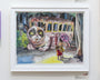 This whimsical illustration by Tim Doyle shows a large, grumpy cat bus with NO on its forehead. A person looks on with an umbrella amid trees and a road, echoing Lil Bub arts imaginative spirit.