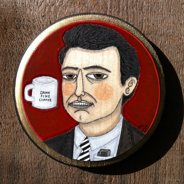 Evan Harriss mixed media art features Agent Cooper in a suit with slicked-back hair holding a DAMN FINE COFFEE mug. The red background enhances its stylized, slightly abstract look.