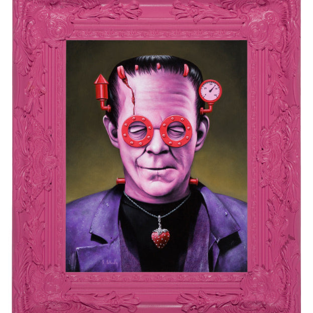 A whimsical Frankenstein portrait in Scott Scheidly style features red goggles, a heart pendant with red bolts, and a purple jacket against a subtle backdrop. It is encased in an ornate pink frame, ideal for display at Spoke Art Gallery.