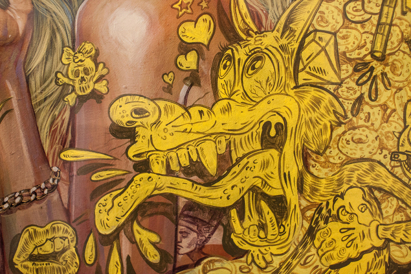 A vibrant Serge Gay Jr.-style illustration shows a yellow cartoon creature with exaggerated features, drooling amid stars, hearts, skulls, and diamonds. A chaotic scene unfolds with a human figure wearing a bracelet in the background.