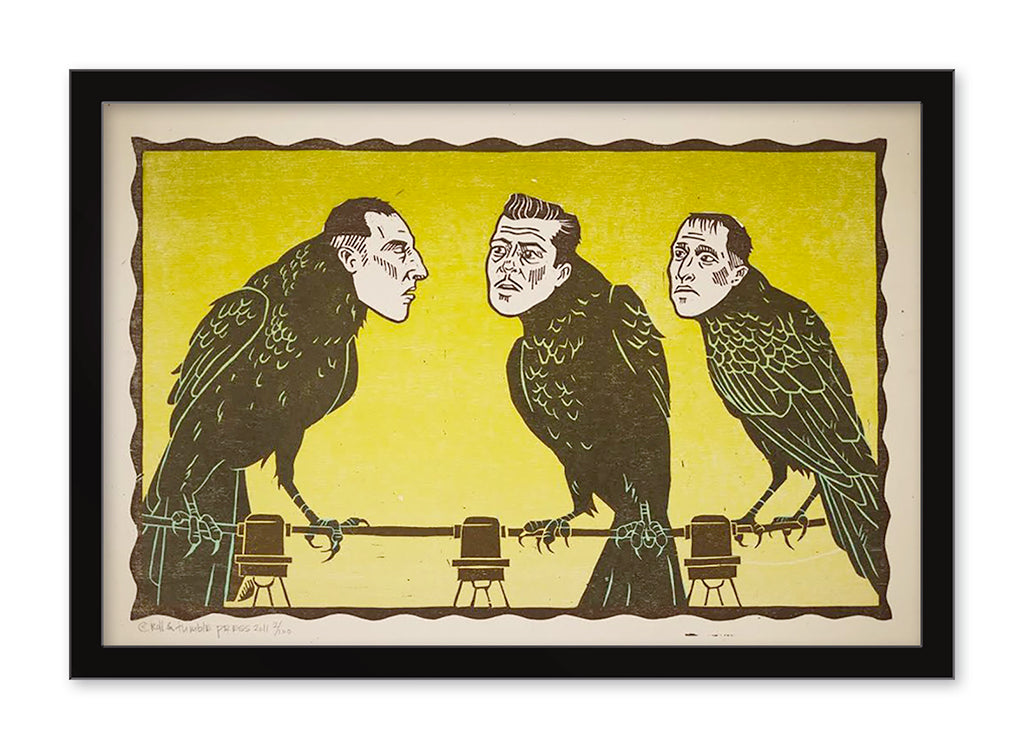 A framed Roll & Tumble artwork, similar to a letterpress woodblock print, shows three vulture-like birds on a wire with human-like faces against a yellow background in a stylized and surreal manner.
