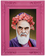 Scott Scheidlys portrait features an elderly man with a white beard, wearing a pink floral crown. His serious expression is framed by a purple garment and an ornate pink frame, reflecting the whimsical style displayed at Spoke Art Gallery.