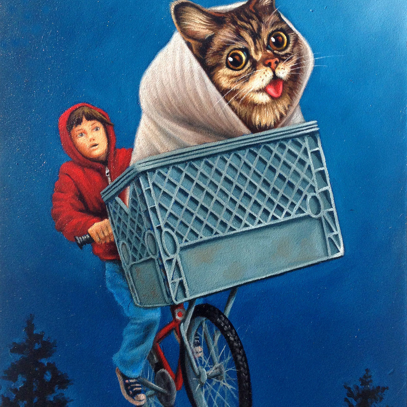 A whimsical painting by Isabel Samaras reminiscent of Lil Bubs Moonlight Ride shows a boy in a red hoodie on a flying bike. The basket holds a large, blanket-wrapped cat, set against a dark blue sky with silhouetted trees below.