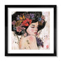 A Stella Im Hultberg framed fine art giclee shows a serene woman with closed eyes, flowers, and leaves in her hair against a light textured background. The piece is signed and numbered for authenticity.
