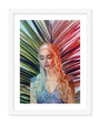 A woman with long, wavy, silver-blonde hair stands elegantly in a textured blue dress. She poses against a vibrant palm leaf backdrop with green, blue, and red hues. Captured as an archival pigment print by Kemi Mai, this striking scene is part of a prestigious group exhibition.