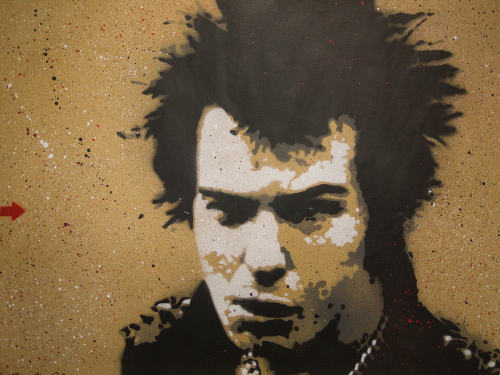 A graffiti-style stencil artwork reminiscent of Sid Vicious, with a spiky hair face on a speckled beige background. It features black, white, gray, and red tones, showcasing Jef Aérosols edgy flair.