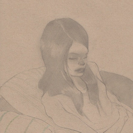A young girl with long hair is shown in this graphite on paper artwork, created in the style of Sam Wolfe Connelly. She sits peacefully with eyes closed, enveloped in a light blanket and leaning against striped cushions.