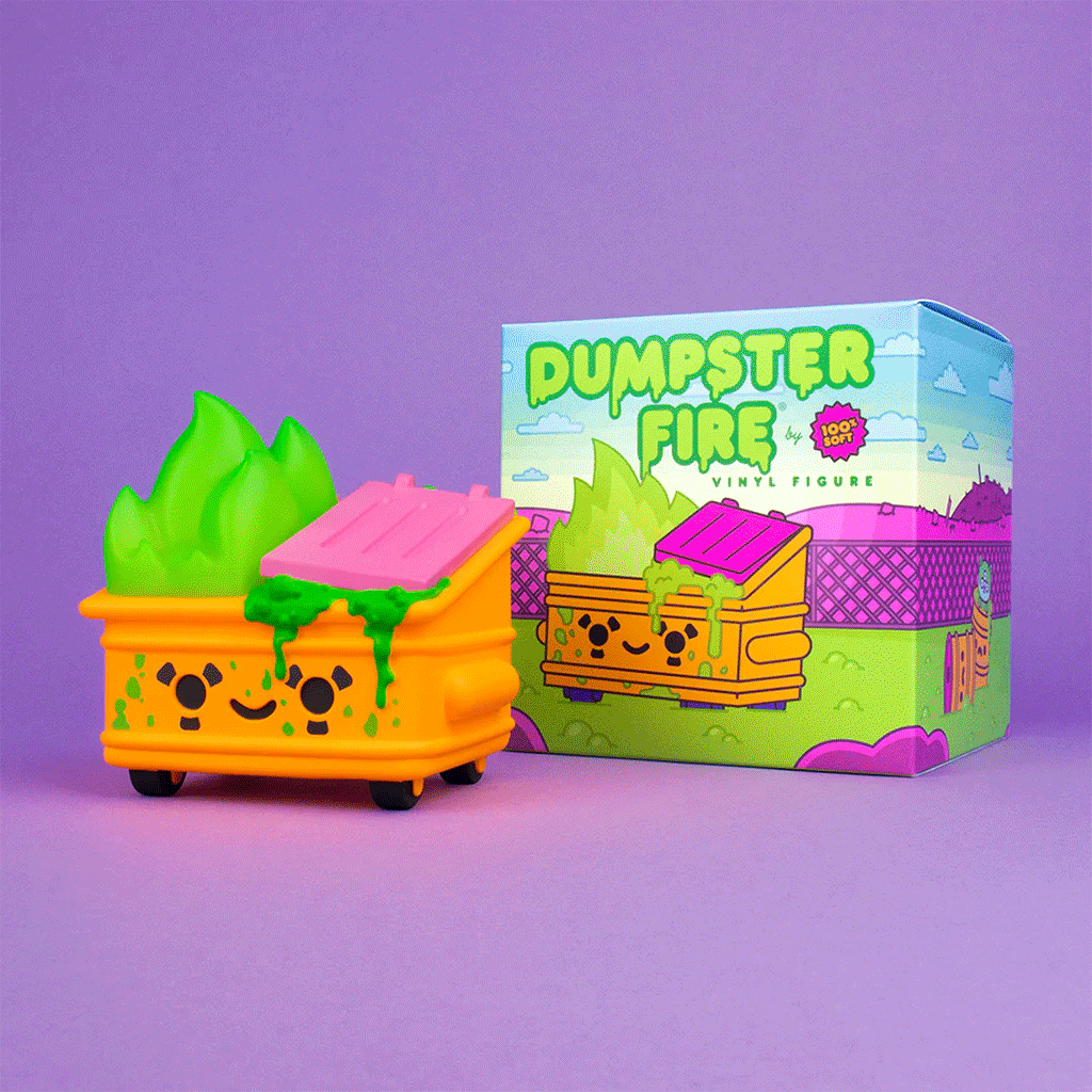 A colorful 100% Soft Dumpster Fire Vinyl Figure, shaped like a smiling dumpster with green flames and orange "Toxic Waste" details, sits by its cartoon-style box labeled Dumpster Fire on a purple background.