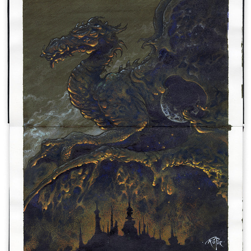 Drawing on an open face Moleskine notebook depicting a large dragon looming above a city in shadows by artist Arik Roper