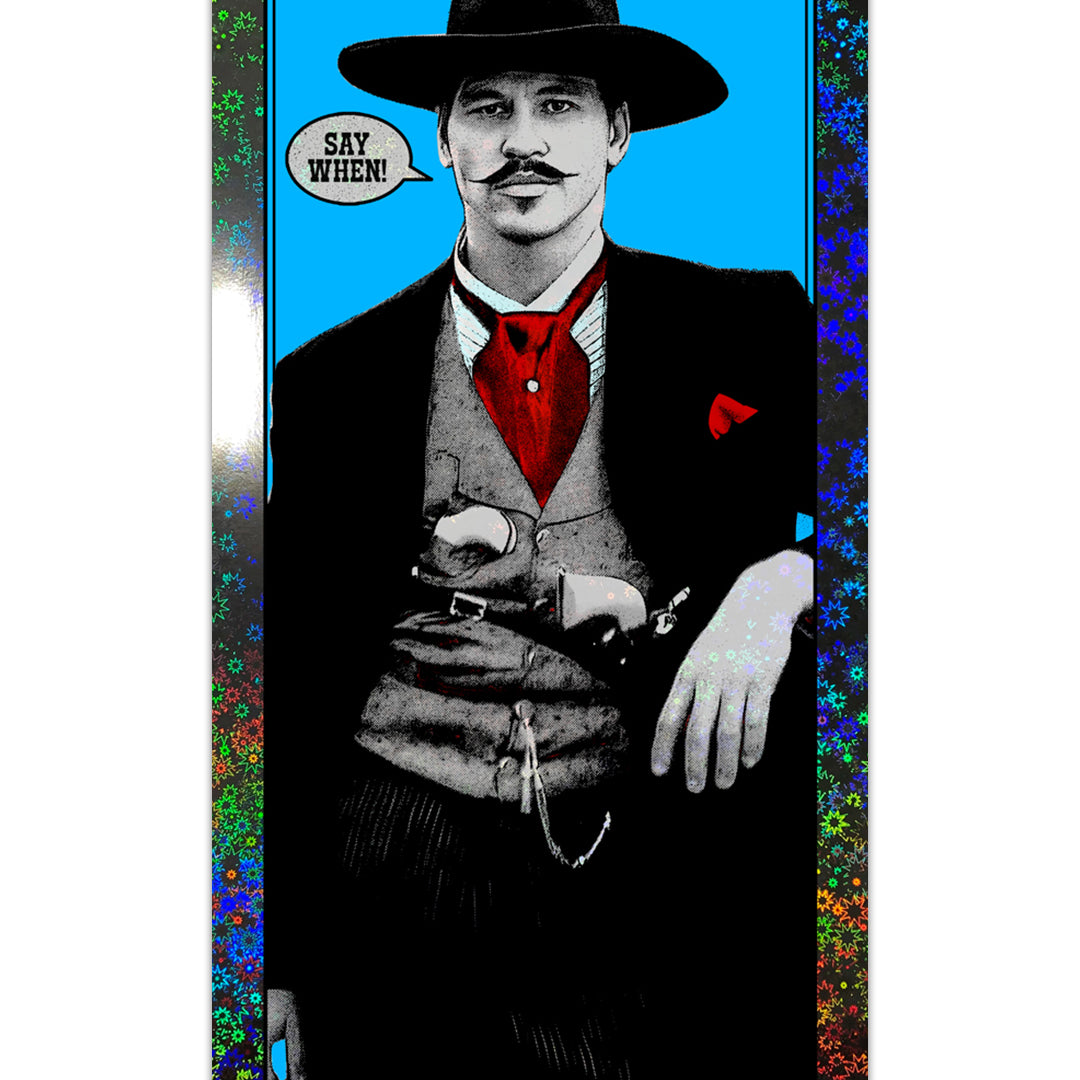 A man dressed as an Old West cowboy in a black hat and suit, red vest and tie, sits confidently with one hand on his belt. A speech bubble says "Say when!" Artwork by Matt Dye with a blue background and screen print holographic border.
