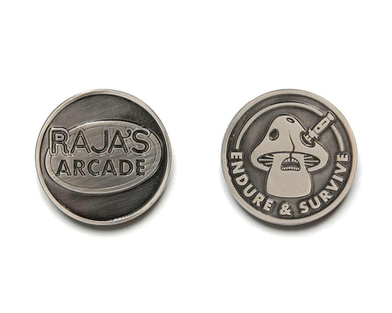Two metallic tokens by Bruce Yan: one side shows the brand name, the other a mushroom shape with a knife and ENDURE & SURVIVE inscribed around the edge.