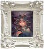 A Spoke Art framed painting in Camilla d'Errico's style shows a girl with large red eyes and dark, wavy hair among colorful moths. The ornate white floral frame enhances the mysterious, surreal vibe of Prophet Of The Night.
