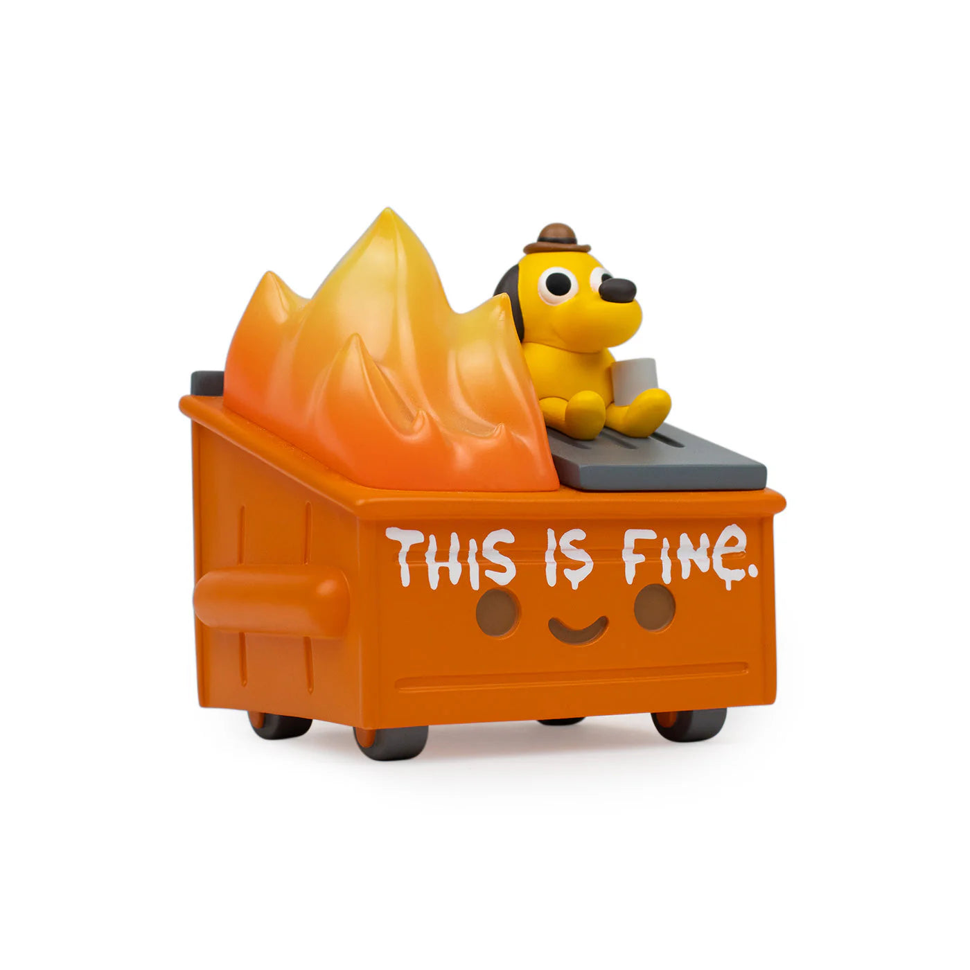 A smiling orange dumpster with "This is fine." written on it, flames billowing out, and a small cartoon dog wearing a hat sitting calmly inside—this 100% Soft Dumpster Fire vinyl figure perfectly captures the spirit of the iconic This is Fine meme in collaboration with KC Green.