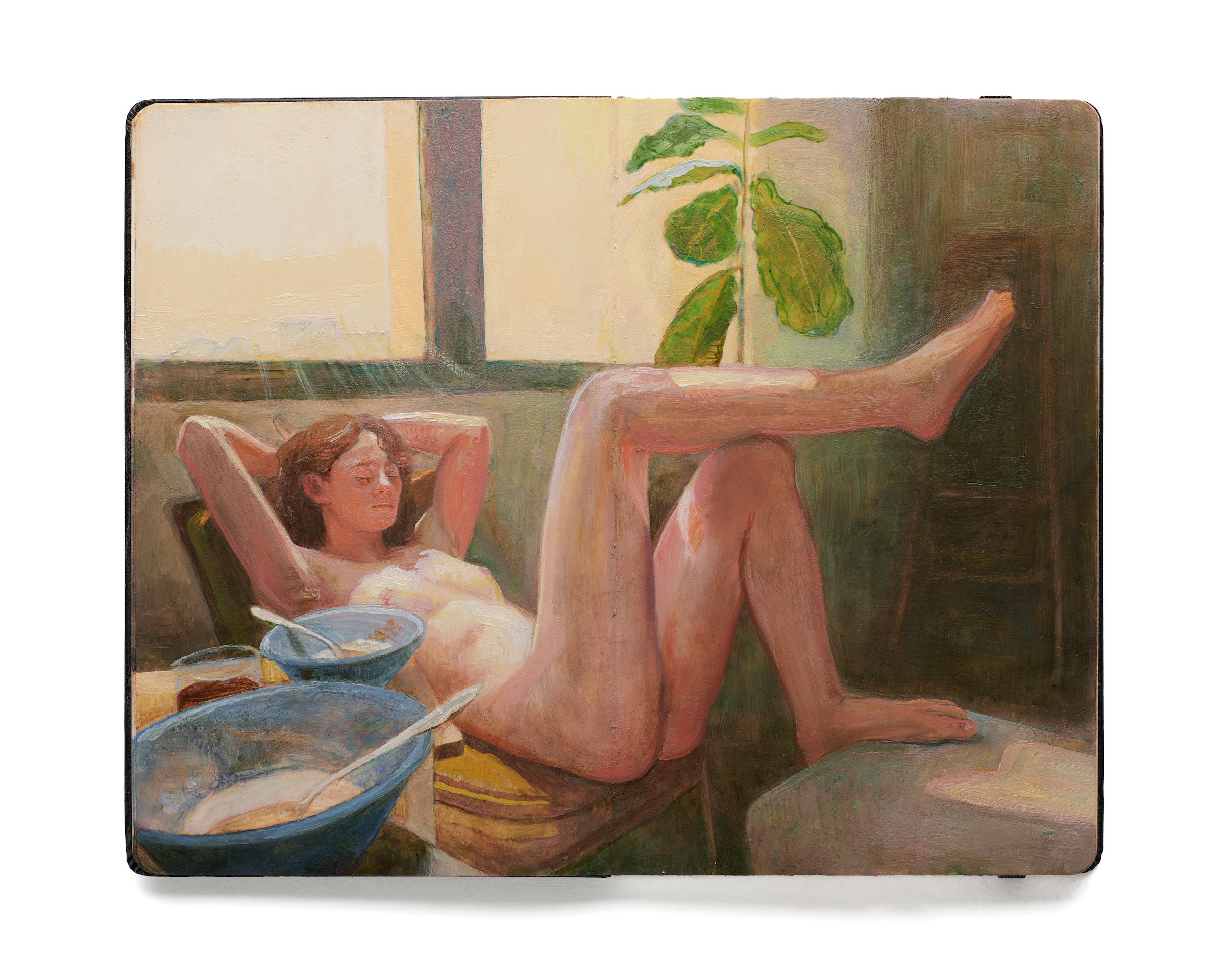 painting in an open face Moleskine notebook of a nude woman reclined in a chair in an interior setting with a fig tree in the background by artist David Molesky