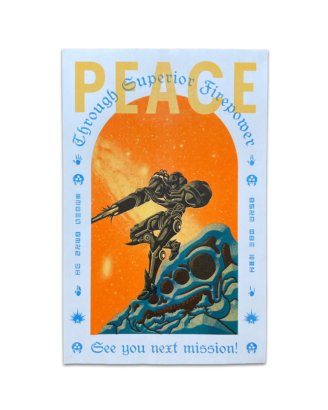 A retro-style Risograph poster by Derek Ballard features a gun-toting robot on a skull-shaped hill, inspired by Metroid. It reads "PEACE Through Superior Firepower See you next mission!" with blue borders and symbols.