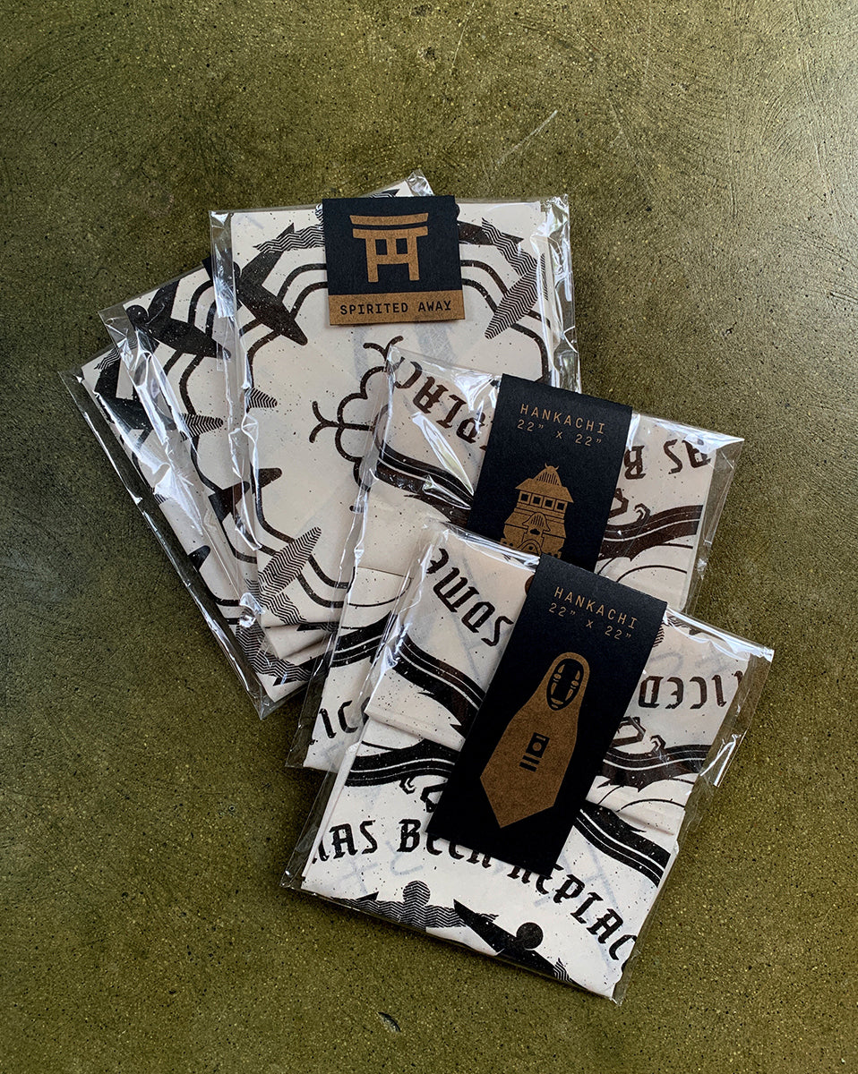 Packaged items with brand labels on a textured surface