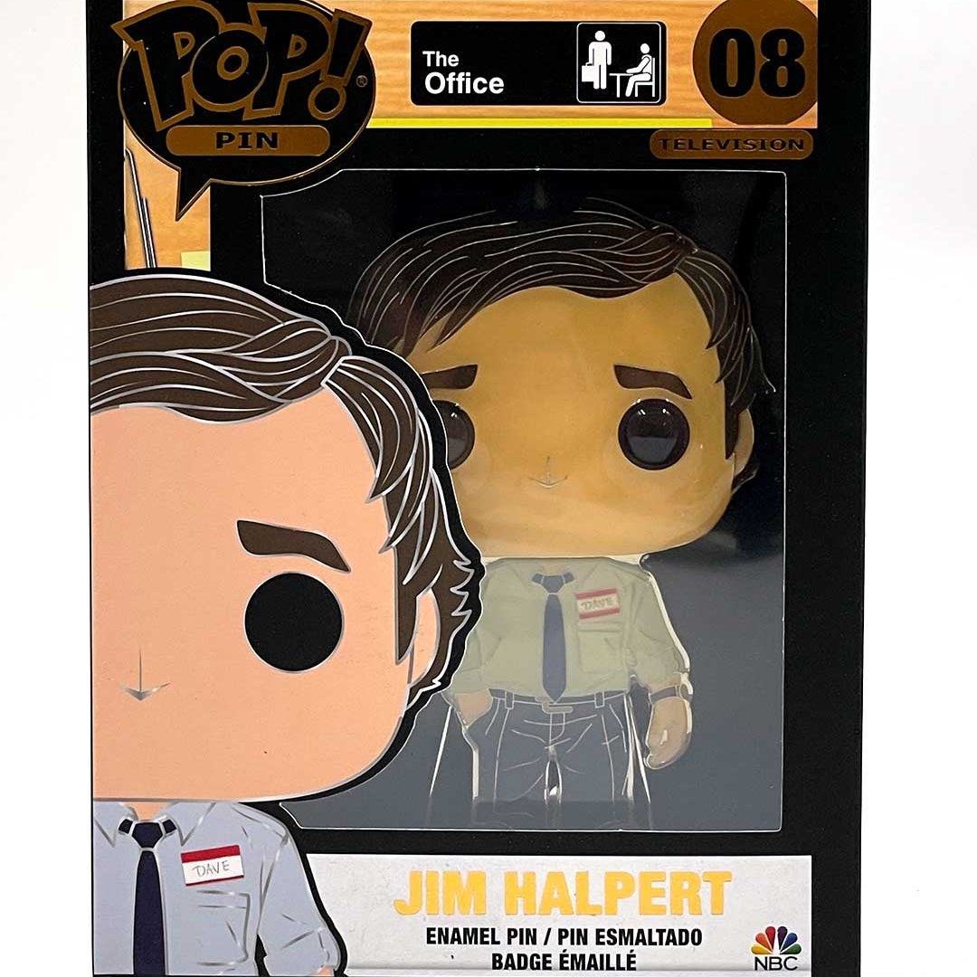Official FUNKO Jim Halpert collectible enamel pin from The Office, boxed. This pin features Jim in his classic white shirt and tie with name tag, and the box displays his name along with series details. A must-have addition for any The Office FUNKO collection!.