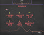 Screenshot of a retro arcade game display in classic Defender art style by Harry Michalakeas, showing pixelated aliens labeled LANDER, MUTANT, BAITER, BOMBER, POD, and SWARMER with score values on a black background with red text.