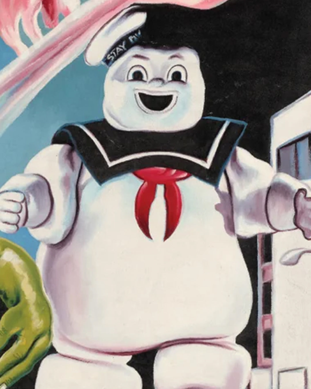 A cheerful cartoon marshmallow mascot with a sailor hat reading "STAY PUFT," inspired by the Ghostbusters character, stands by a building in this vibrant Deadly Prey digital print.