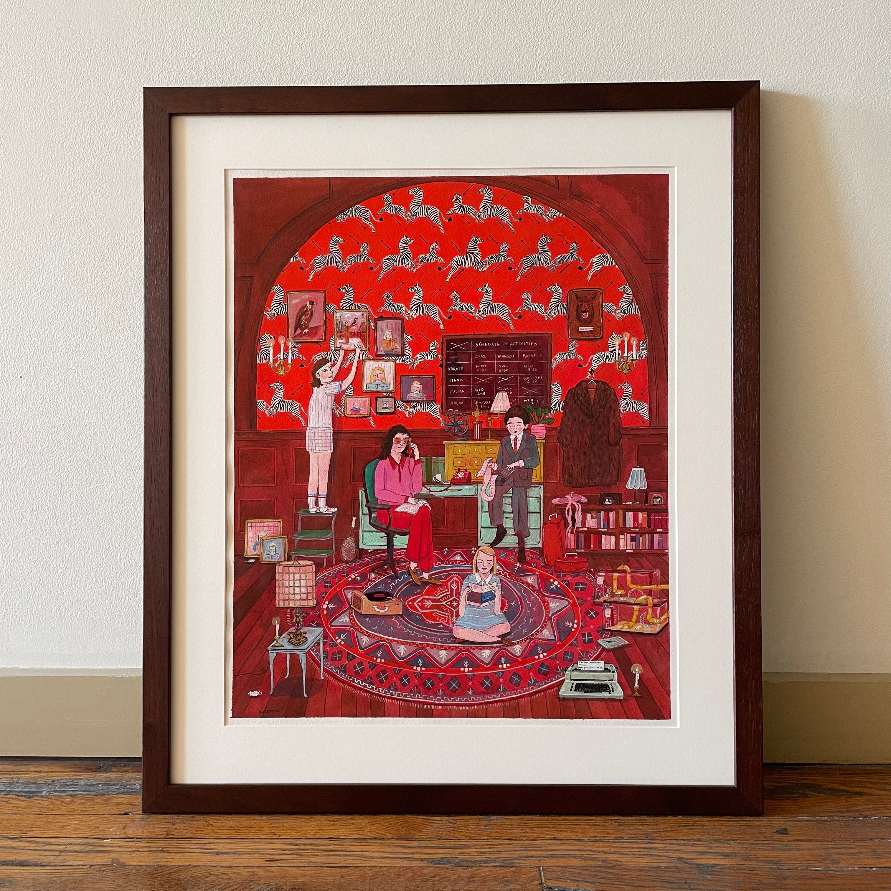 A Jill Kittock framed painting depicts a cozy room akin to The Royal Tenenbaums, featuring a child on a laptop, two adults on a couch, and another reaching for a book. Red wallpaper with animal motifs and a colorful round rug enhance its warmth.