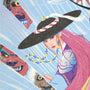 A person with long pink hair in traditional attire and a wide black hat with beads gazes forward. Behind them are stylized, colorful Mudang Demon Hunters faces on a blue screen print background. Artwork by Jason Raish.