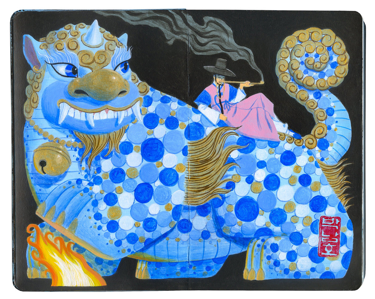 painting on an open face Moleskine notebook of a blue mythical beast with various colored spots and a man reclined on its back by artist Jason Raish