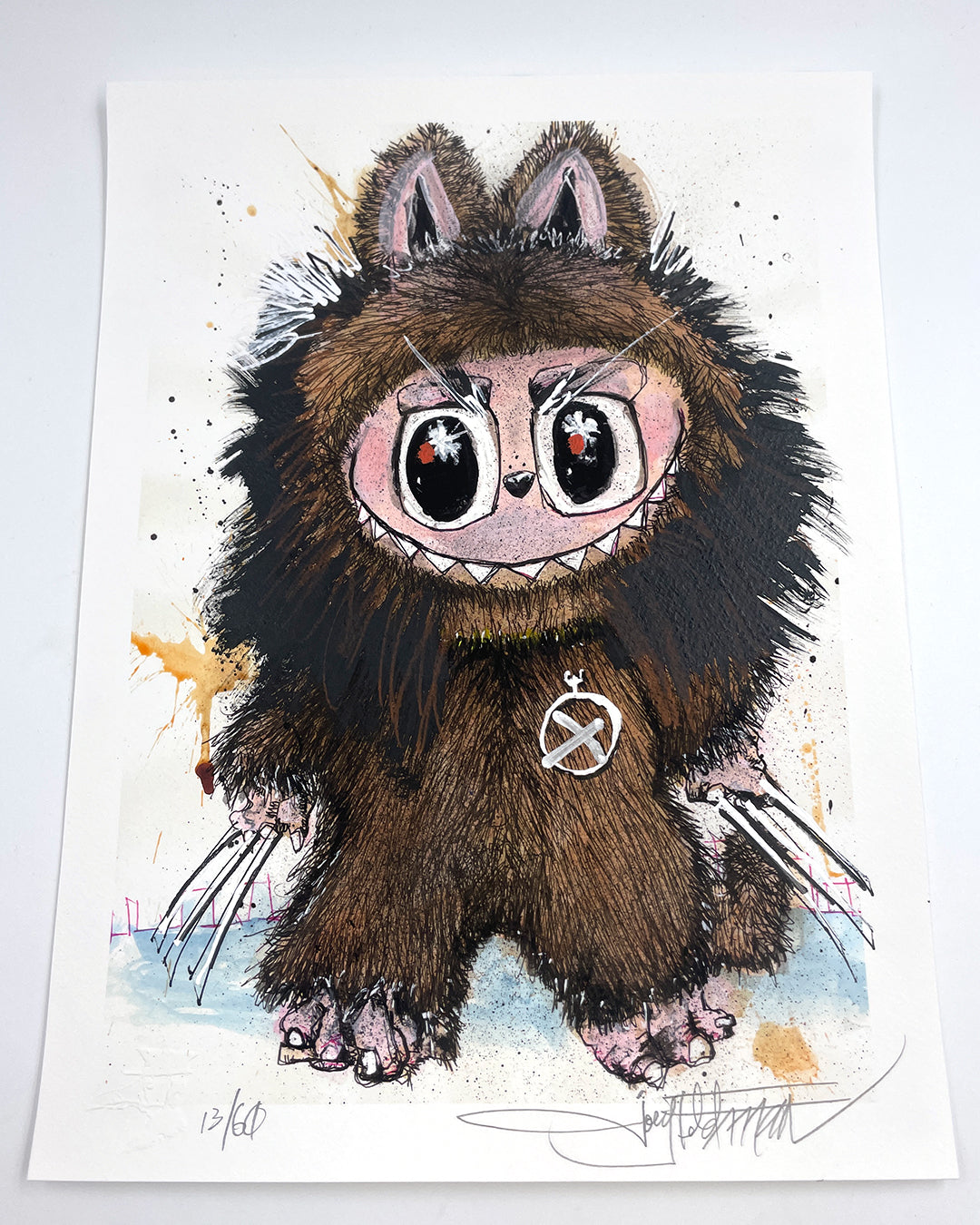 A wide-eyed, cartoonish creature with sharp claws, brown fur, big ears, and a silver necklace stands out against a painted background with splashes and embellishments in Joey Feldman’s signature style.