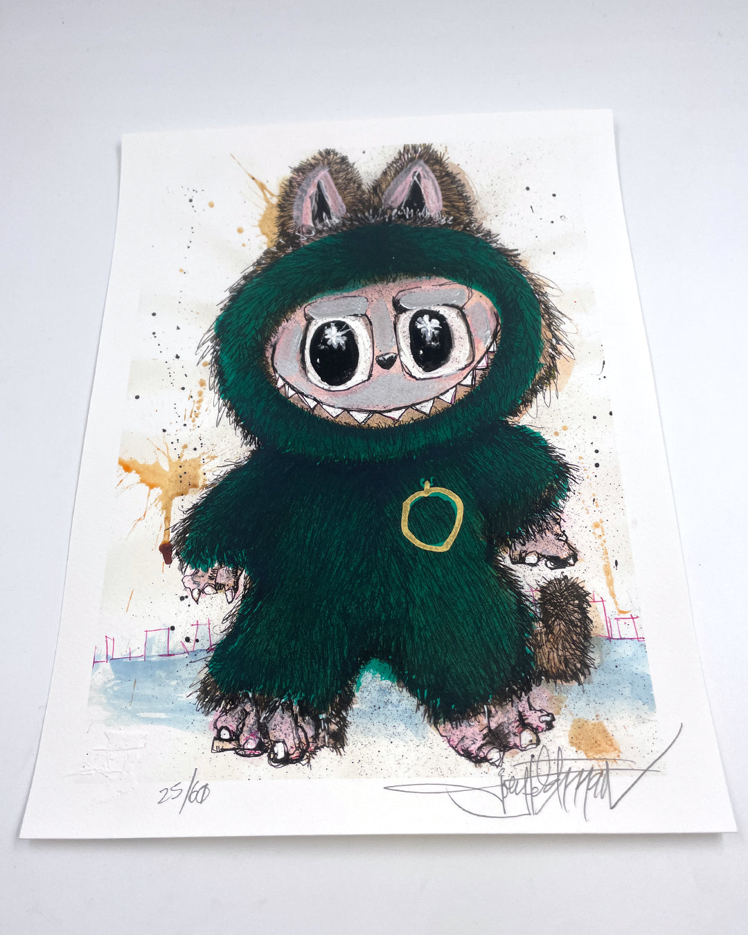 A Joey Feldman drawing of a smiling cartoon character in a furry green suit with cat ears, tail, large round eyes, and a chest ring. This hand-embellished artwork is signed and numbered 25/60.