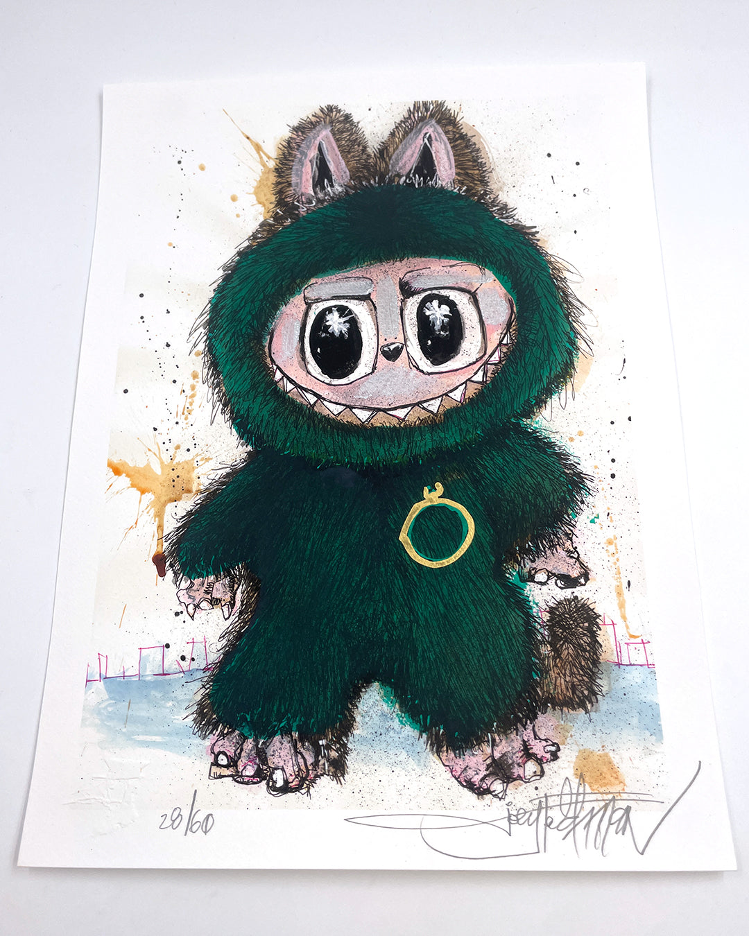 A wide-eyed cartoon creature in a fuzzy green suit holds a gold ring amid abstract splatters. This Joey Feldman artwork is hand-signed at the bottom and features unique hand-painted embellishments.