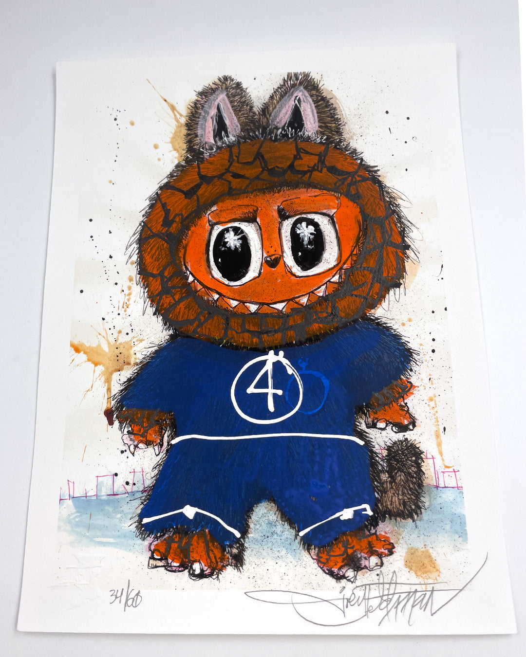 A vibrant Joey Feldman archival pigment print depicts a furry, brown creature with big eyes, cat-like ears, and a blue Fantastic Four suit with a number 4 on its chest. The artwork is signed and numbered.