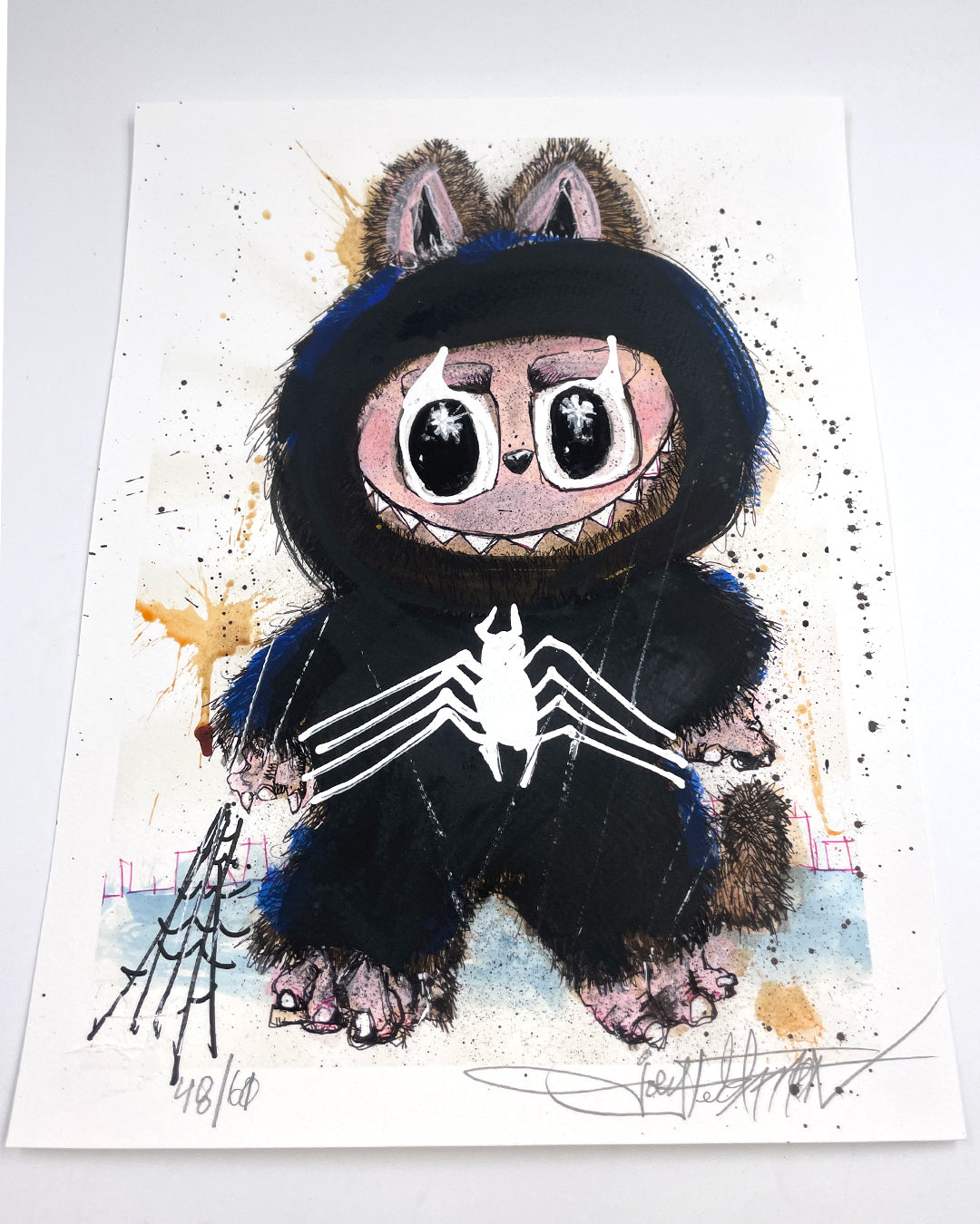 A whimsical Joey Feldman illustration features a wide-eyed character in a furry, Venom-inspired hood with hand-painted details, signed lower left, numbered 48/60 as an archival pigment print.