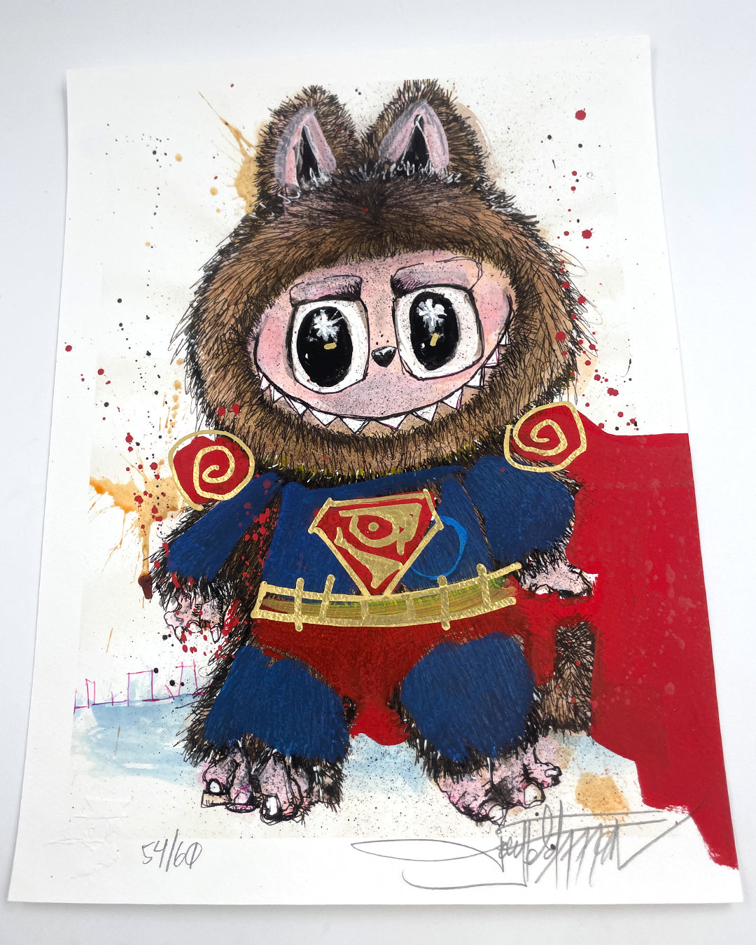 A furry cartoon hero in a cape with an S emblem stands on a colorful splattered background. This Joey Feldman archival pigment print includes hand-painted embellishments and comes signed and numbered.