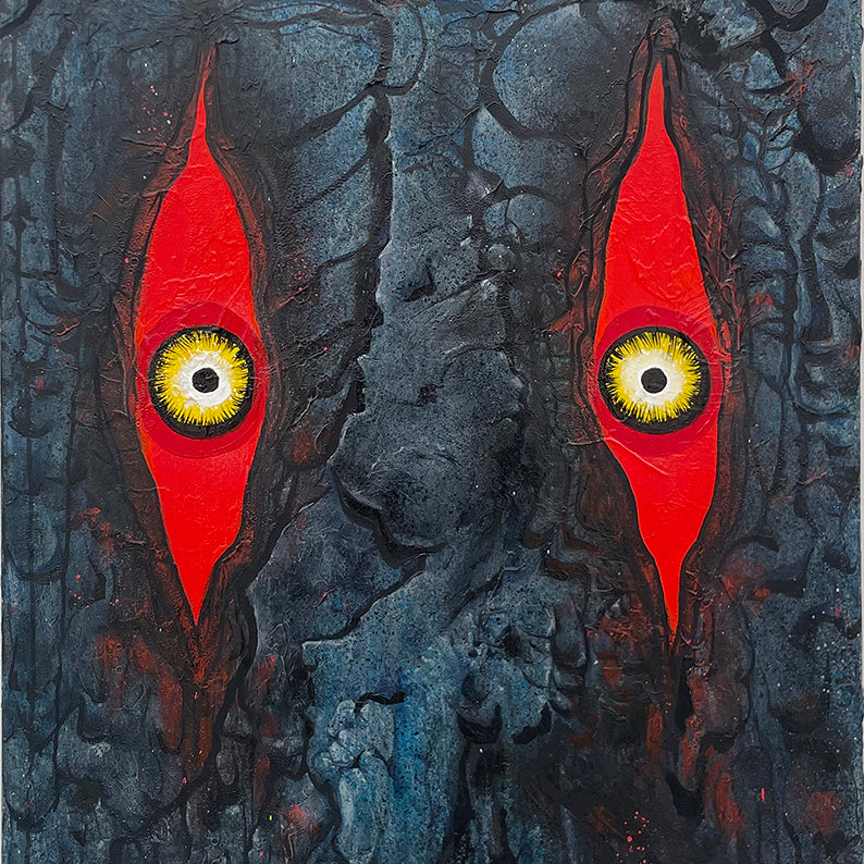 Painting of Godzilla's red eyes with yellow and black pupils 