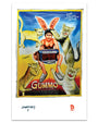 A vibrant Deadly Prey print featuring a person with rabbit ears playing an accordion, surrounded by four large cats on a yellow background. “GUMMO” appears boldly at the bottom, channeling playful energy and creative flair.