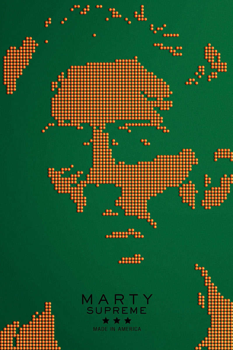 A portrait of a man's face made from rows of orange ping pong balls on green, in Akiko Stehrenberger's bold screen print style, with "Marty Supreme" and "Made in America" text displayed below. Brand: Akiko Stehrenberger.