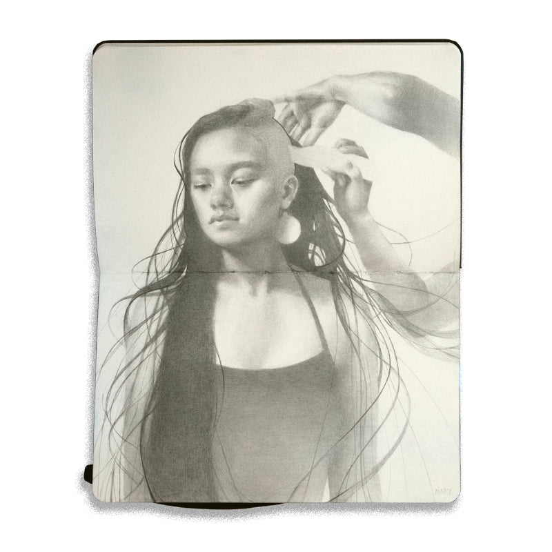 graphite drawing on an open face Moleskine notebook depicting a woman with long hair getting a buzzcut by artist Mary Lippert