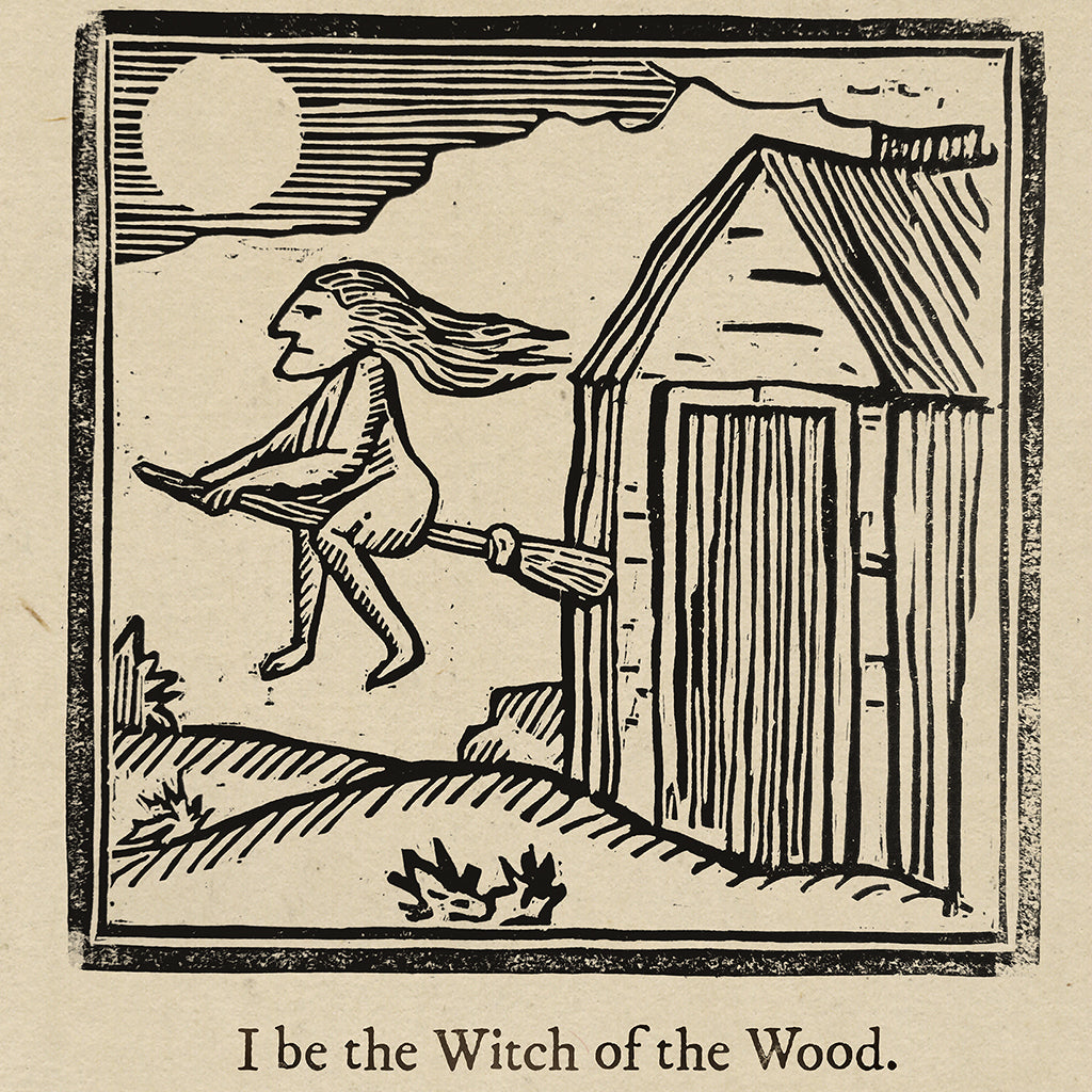 A black and white woodcut-style archival pigment print by Max Dalton, inspired by The VVitch, shows a witch flying past a shed with the sun overhead. Features the text: I be the Witch of the Wood.